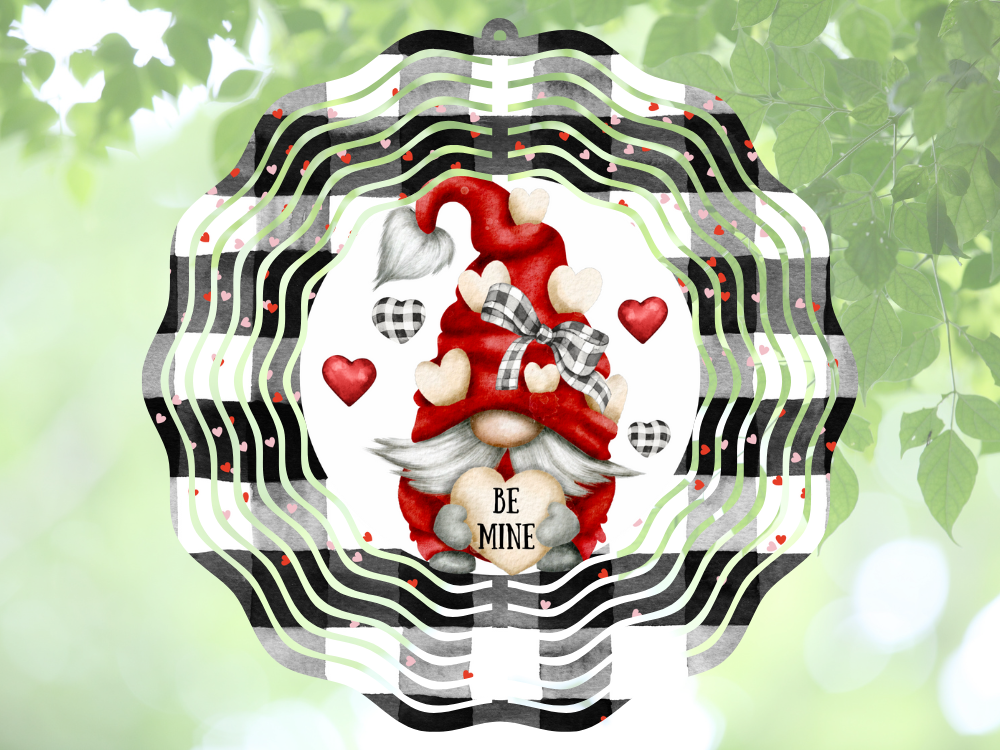 Gnome with red hat and heart-shaped text 'Be Mine' on a decorative background with plaid pattern wind spinner by Coastal Ginger Creations 