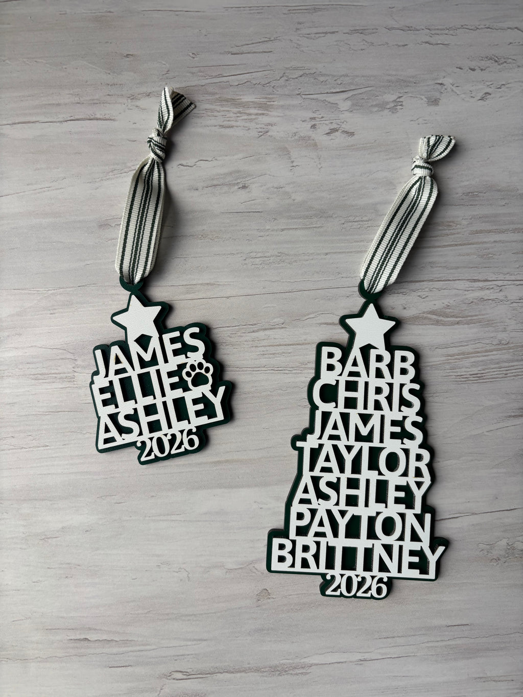 Stacked Names in the Shape of a Christmas Tree in white with a green backer